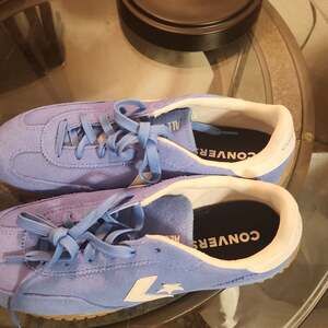 Converse Run Star Sneakers in blue with white detail and gumsole